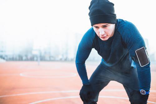 Man taking a break from his workout
