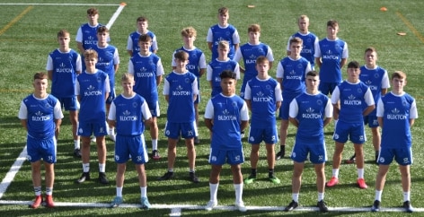 Buxton FC Academy students on a field