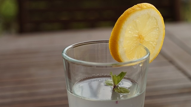 Drinking lemon with water hot sale